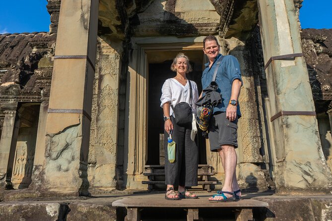 Angkor Adventure Vespa Tour / Tuk Tuk or Car - Ta Prohm and the trees over the ruins