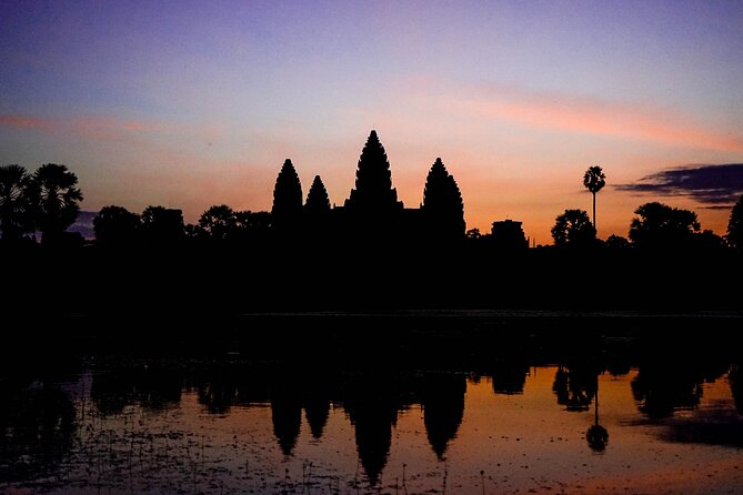 Angkor Sunrise Vespa Tour / Tuk Tuk or Car - Angkor Thom and Bayon’s stone faces