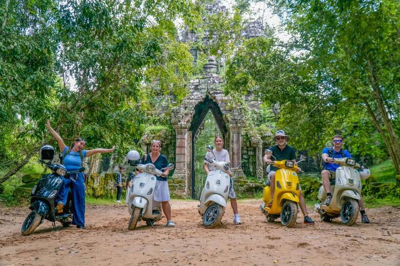 Angkor Wat: Guided Vespa Tour / Tuk Tuk or Car - Ta Prohm and the trees over the ruins