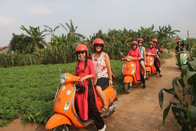 Beautiful Female Riders Vespa Red River Countryside Tour 5 Hours - Fruit farms, local hosts, and time for photographs