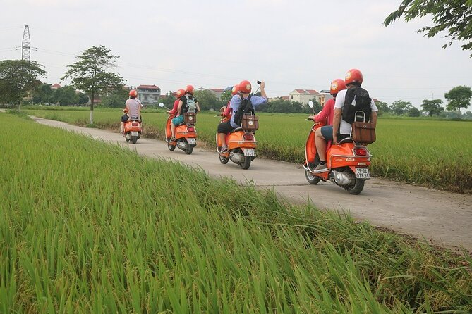 Beautiful Female Riders Vespa Red River Countryside Tour 5 Hours - The guides and the feel of the ride