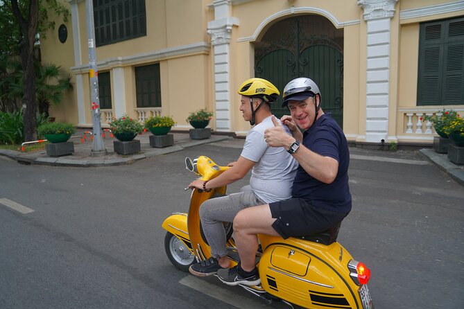 Dining Delights - Vintage Vespa Tour in Saigon - Riding through Saigon after sunset