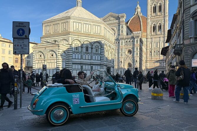 Discover Florence city center on e-cabriot fiat 500 - Piazzale Michelangelo delivers the big view