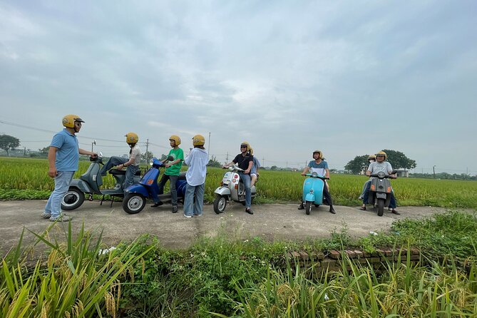 Exploring Vespa Tour Through Little Red River Delta - A short look at Hanoi Opera House