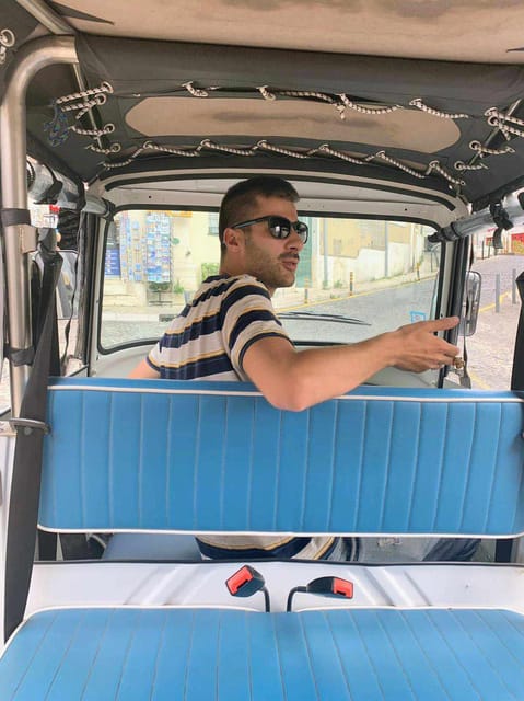Guided Electric Piaggio Tuk-Tuk Tour of Historic Lisbon - Chiado and Largo do Carmo: a change of mood