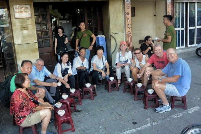 Hanoi Michelin Star Food Tour Via Jeep, Vespa or Motorbike - Train Street after dark