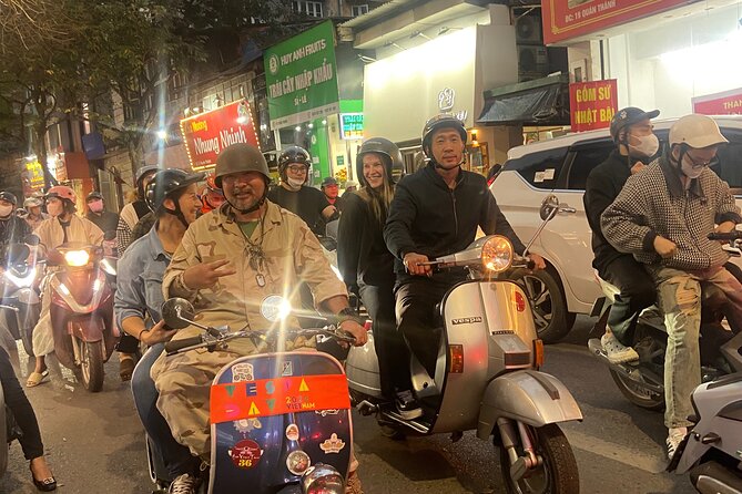 Hanoi Motorbike Tours with Female Riders - Train Street starts the route with a jolt