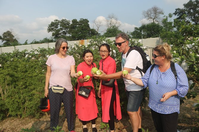 Hanoi Vespa Full Day City & Countryside with Female Ao Dai Riders - West Lake, Huu Hiep Lake, and the B52 site