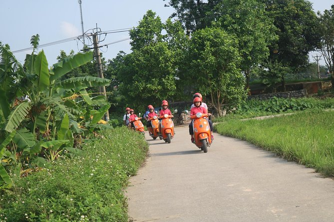 Hanoi Vespa Full Day City & Countryside with Female Ao Dai Riders - Ba Dinh Square and An Duong Market