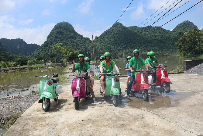 Hoi An Vespa Tour Rural Villages Experience - Fishing boats and a bamboo bridge