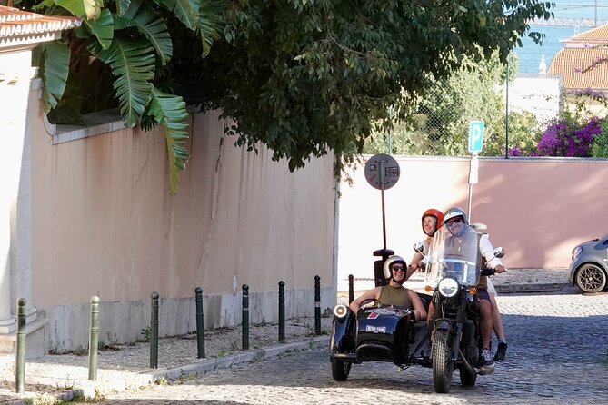Lisbon Historic - Private Vintage Sidecar Tour - A garden, an iron tree, and local café life