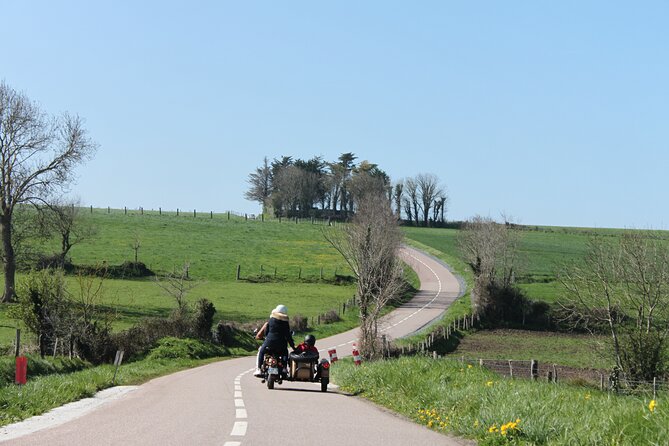 Normandy WWII Private Half-day Sidecar Tour From Bayeux - Omaha Beach, where the tour turns solemn