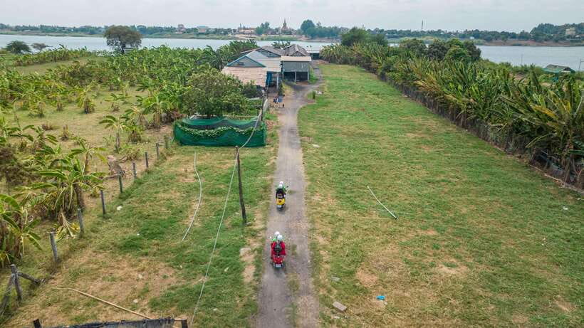 Phnom Penh Silk Island Sunset Vespa Tour / Tuk Tuk Available - SMango House Resort and sunset over Phnom Penh