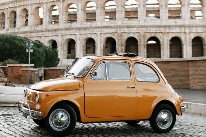 Private: 3 hours panoramic tour of Rome aboard a vintage Fiat 500 - Returning to the Colosseum and seeing the forums
