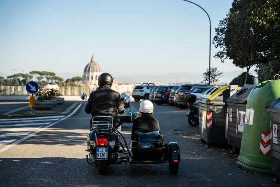Rome: Evening Vespa Sidecar City Tour - The Colosseum at sunset