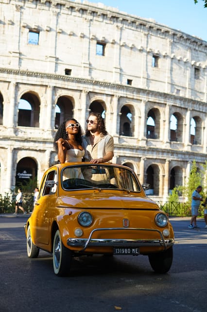 Rome Pro Photoshoot Service with Free Transport by Fiat 500 - Colosseum photo stop: the main Roman backdrop