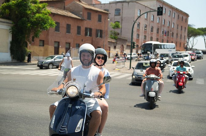 Rome’s Highest Hills Skyline Vespa Tour with Driver and Photo - Passing through Trastevere
