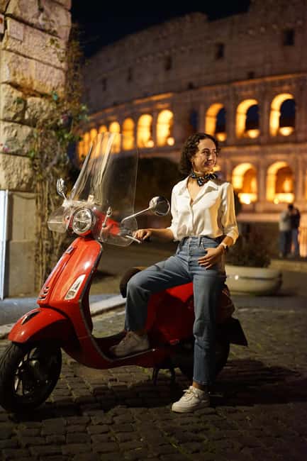 Rome: Vespa Night Experience with Aperol Spritz & Photos - The Colosseum lit at night