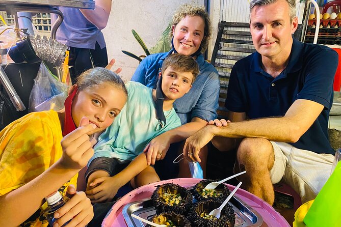 Saigon Morning And Afternoon Adventure Street Food Tour by Vespa - A floating market and coconut juice from the Mekong Delta