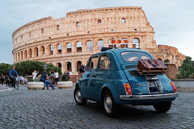 Tour of Rome Aboard a Vintage Fiat 500 - The Palatine view and the Colosseum pause