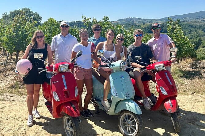 Tuscany Sunset Vespa tour with Dinner at a Chianti Winery - Riding a Vespa beside vineyards and olive groves