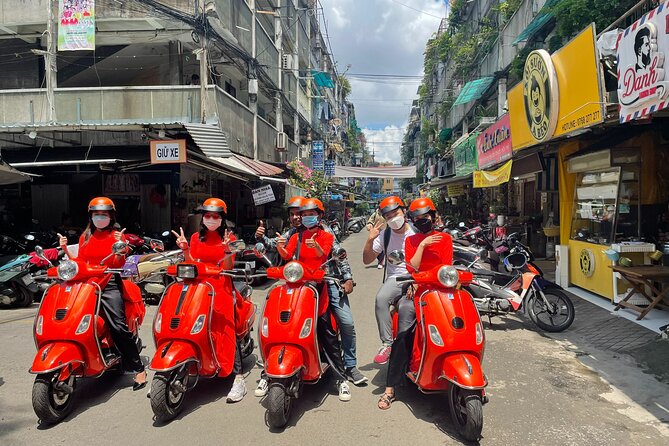 Vespa Female Ao Dai riders Night Street Food + See Train Street - Starting in the Old Quarter at 6 p.m.