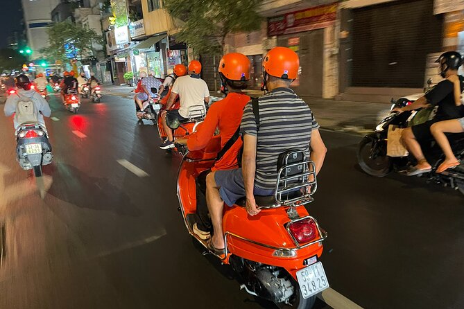 Vespa Female Ao Dai riders Night Street Food + See Train Street - The female-led format and guide experience