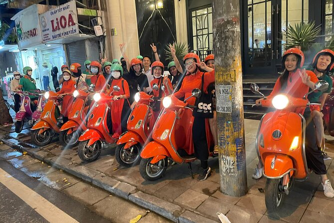 Vespa Female Ao Dai riders Night Street Food + See Train Street - The Opera House and Hanoi’s evening streets