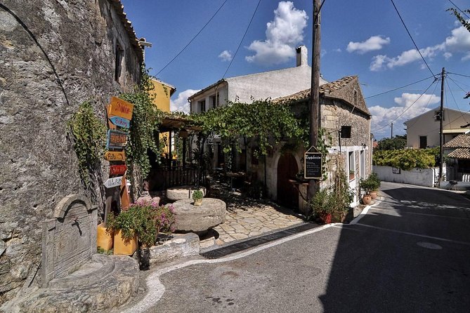 Vespa Scooter Tour "Off the beaten path Local Villages " 3-hour scooter tour - Returning through Corfu Old Town