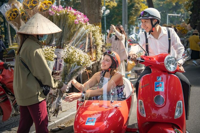Vespa Sidecar Sightseeing and Cuisine Tour in Hanoi - Tran Quoc Pagoda beside the lake