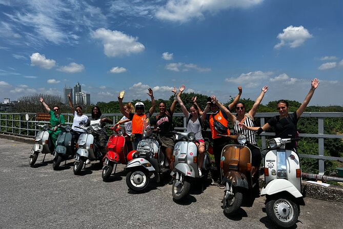 Vespa Tour HANOI BACK STREETS: FOOD+LOCAL LIFE+CULTURE & FUN - The mosaic wall and Huu Tiep Lake